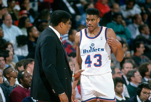 Pervis Ellison en compagnie de son Wes Unseld. © Focus on Sport