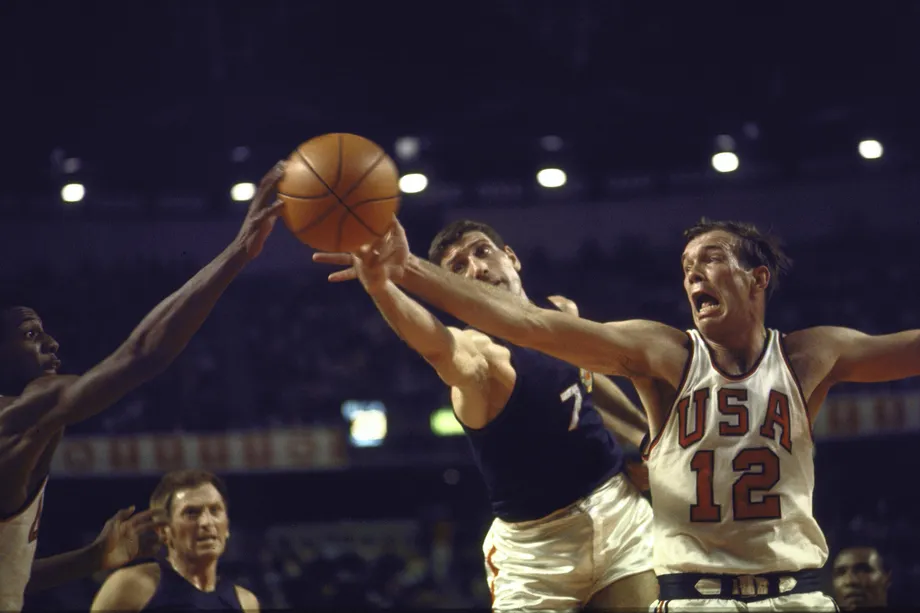 MEXICO - OCTOBER 12: Basketball: 1968 Summer Olympics, USA Michael Silliman (12) in action, getting loose ball vs YUG Trajko Rajkovic (7), Mexico City, MEX 10/12/1968--10/27/1968 (Photo by Jerry Cooke/Sports Illustrated via Getty Images) (SetNumber: X13567)