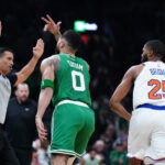 Oct 22, 2024; Boston, Massachusetts, USA; Boston Celtics forward Jayson Tatum (0) reacts after his three point basket against the New York Knicks in the first quarter at TD Garden. © David Butler II-Imagn Images