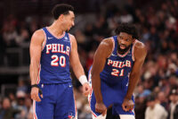 CHICAGO, ILLINOIS - NOVEMBER 04: Jared McCain #20 and Joel Embiid #21 of the Philadelphia 76ers confer against the Chicago Bulls during the first half at the United Center on November 04, 2025 in Chicago, Illinois. NOTE TO USER: User expressly acknowledges and agrees that, by downloading and or using this photograph, User is consenting to the terms and conditions of the Getty Images License Agreement. (Photo by Michael Reaves/Getty Images)